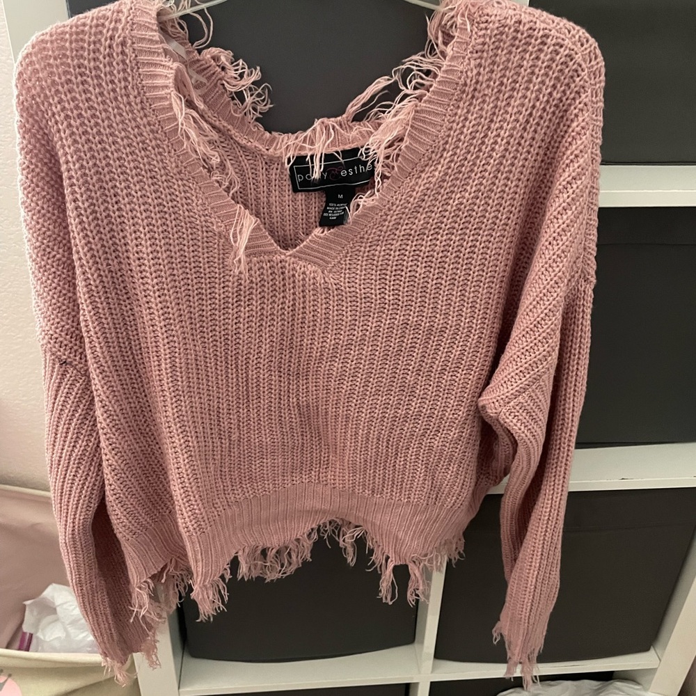 Slightly cropped teased sweater